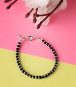  women silver plated black beaded adjustable rakhi with roli chawal