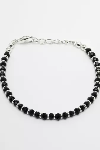  women silver plated black beaded adjustable rakhi with roli chawal