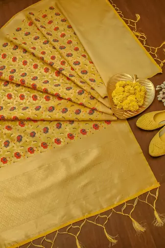 Yellow soft banarasi silk zari woven design dress material