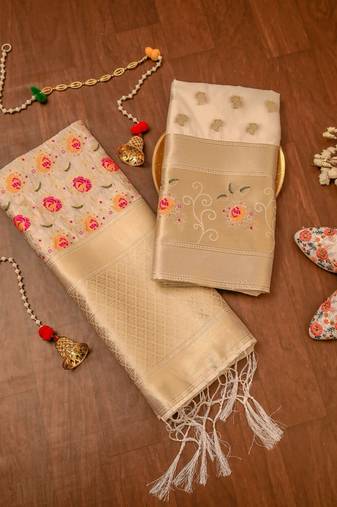 Cream soft banarasi silk zari woven design dress material