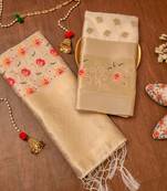 Cream soft banarasi silk zari woven design dress material