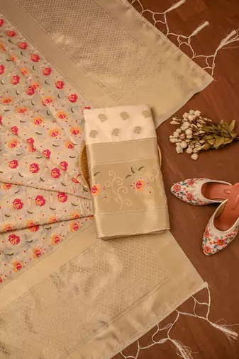 Cream soft banarasi silk zari woven design dress material