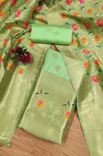 Pista soft banarasi silk zari woven design dress material