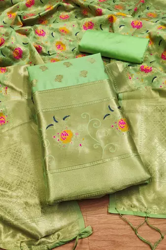 Pista soft banarasi silk zari woven design dress material