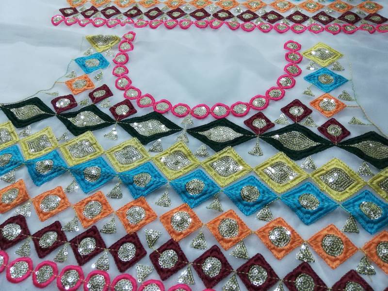 SPLENDID WHITE SEQUINS EMBROIDERED GEORGETTE FOR FESTIVALS SPECIAL LEHENGA