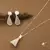 White Cone Shaped Necklace With Matching Earrings