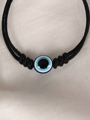 Nvr unisex black evil eye rakhi with roli chawal 4