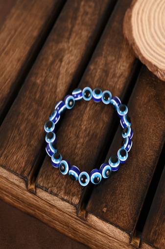  unisex blue evil eye rakhi with roli chawal