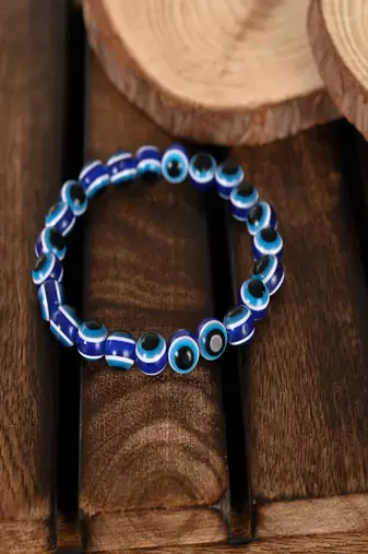  unisex blue evil eye rakhi with roli chawal