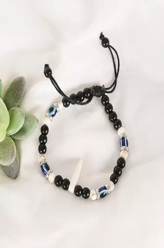  unisex black evil eye rakhi with roli chawal