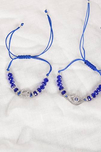  unisex set of 2 blue evil eye rakhi with roli chawal