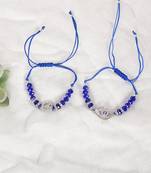  unisex set of 2 blue evil eye rakhi with roli chawal