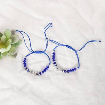  unisex set of 2 blue evil eye rakhi with roli chawal 4