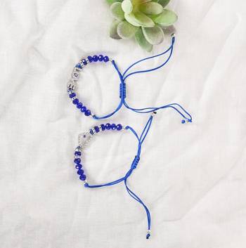  unisex set of 2 blue evil eye rakhi with roli chawal 5