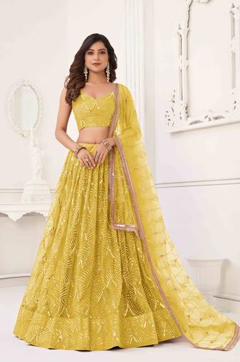 YELLOW COLOR NET FABRIC LEHENGA CHOLI WITH SEQUINS AND THREAD EMBROIDERY WORK