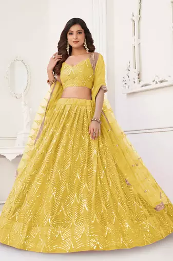 YELLOW NET FABRIC LEHENGA CHOLI WITH SEQUINS AND THREAD EMBROIDERY WORK