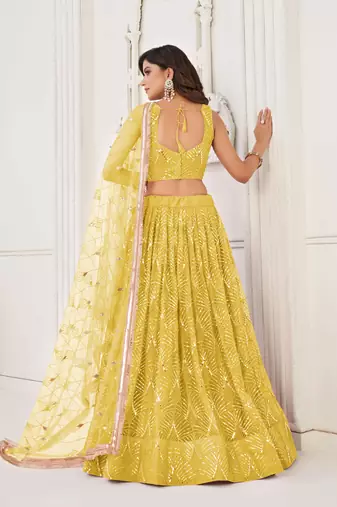 YELLOW NET FABRIC LEHENGA CHOLI WITH SEQUINS AND THREAD EMBROIDERY WORK