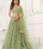 PISTA GREEN NET FABRIC LEHENGA CHOLI WITH SEQUINS AND THREAD EMBROIDERY WORK