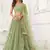 PISTA GREEN NET FABRIC LEHENGA CHOLI WITH SEQUINS AND THREAD EMBROIDERY WORK