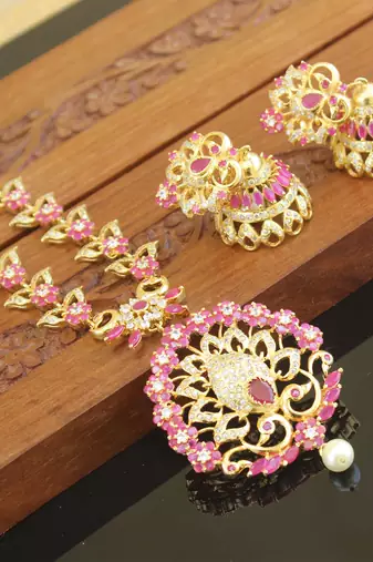 Elegant gold plated ruby peacock necklace set