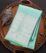 Blue woven banarasi silk saree with blouse