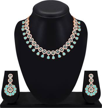 Atasi international rose gold plated aqua blue kundan and american diamond necklace with earrings 1