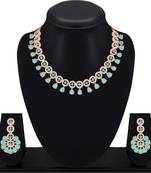 Atasi international rose gold plated aqua blue kundan and american diamond necklace with earrings