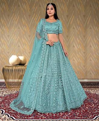 net fabric lehenga choli with zari and diamond work in green color 1