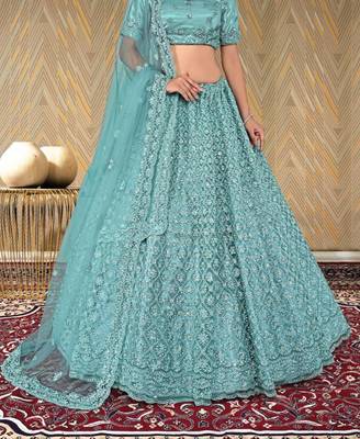 net fabric lehenga choli with zari and diamond work in green color 3