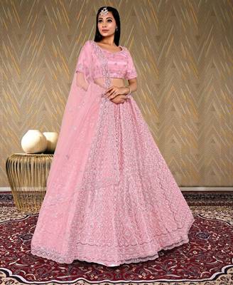 net fabric lehenga choli with zari and diamond work in peach color 1