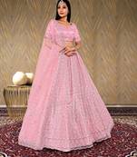 net fabric lehenga choli with zari and diamond work in peach color