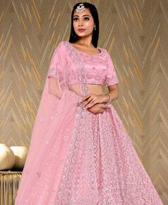 net fabric lehenga choli with zari and diamond work in peach color 2