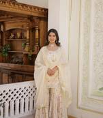 Heavy looks white colour wedding wear partywear jacquard fabric sequins work sharara dress