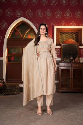 Graceful traditional suit in beautiful beige colour for trendy party looks 1