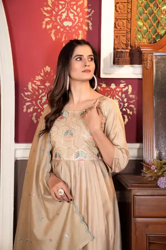 Graceful traditional suit in beautiful beige colour for trendy party looks