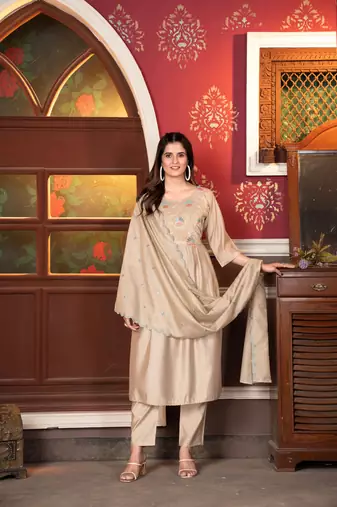 Graceful traditional suit in beautiful beige colour for trendy party looks