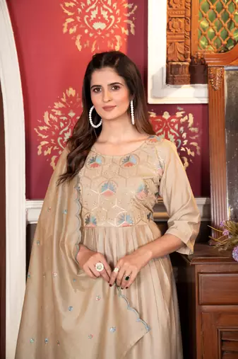 Graceful traditional suit in beautiful beige colour for trendy party looks