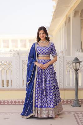 MESMERIZING BLUE SEQUINS EMBROIDERED VISCOSE JACQUARD LEHENGA CHOLI FOR WEDDING 1