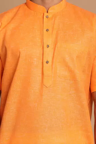 orange and white cotton blend kurta and mundu set