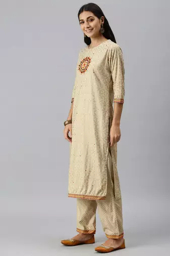 women's round neck floral foil print cream straight kurta and palazzos with dupatta
