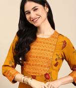 women's round neck floral foil print mustard straight kurta and palazzos