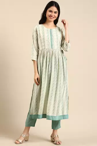 women's round neck solid cream anarkali kurta and trouser