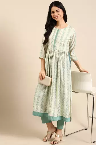 women's round neck solid cream anarkali kurta and trouser