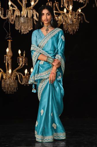 Sky blue colour tissue silk embroidered saree online