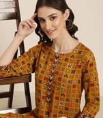 women's round neck geometric foil print mustard straight kurta and palazzos