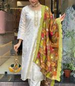 Graceful traditional suit in beautiful white colour for trendy party looks