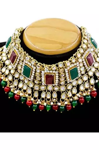 traditional pearl studded bridal choker necklace with earrings and maang tikka jewellery set