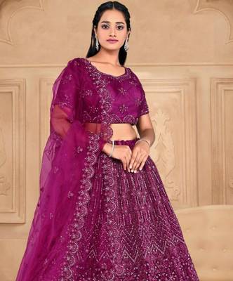 net fabric lehenga choli with zari work in wine color  2