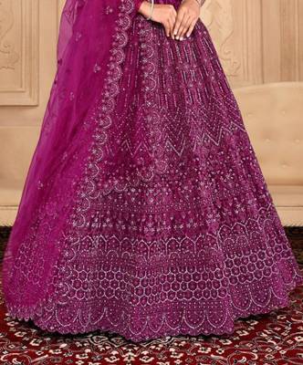 net fabric lehenga choli with zari work in wine color  3