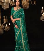 Dark green colour tissue silk sarees for women